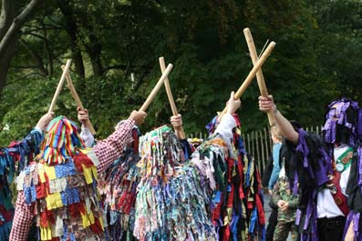 Crook Morris wearing Border-style rags, brandishing sticks